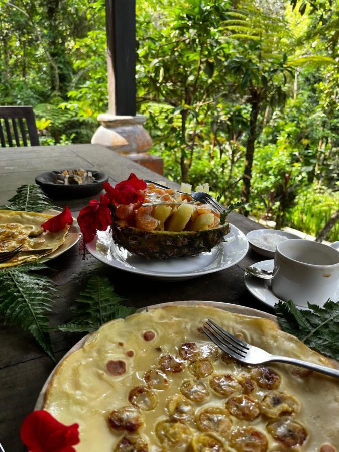 Happy Ria Homestay & Guesthouse Bukit Lawang Bagian luar foto