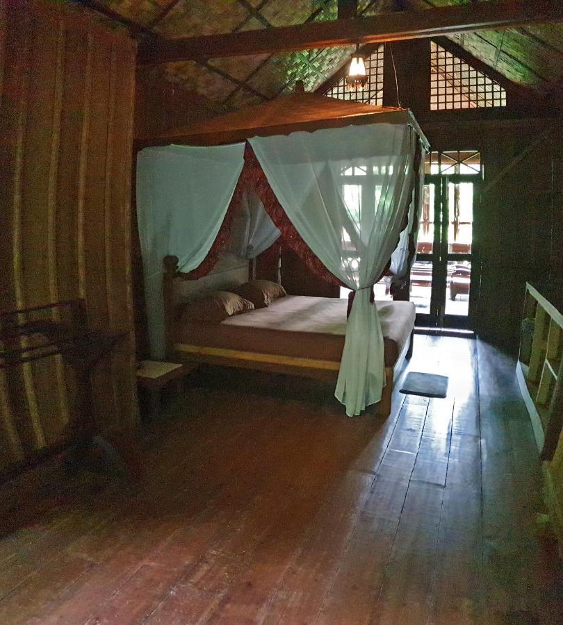 Happy Ria Homestay & Guesthouse Bukit Lawang Bagian luar foto